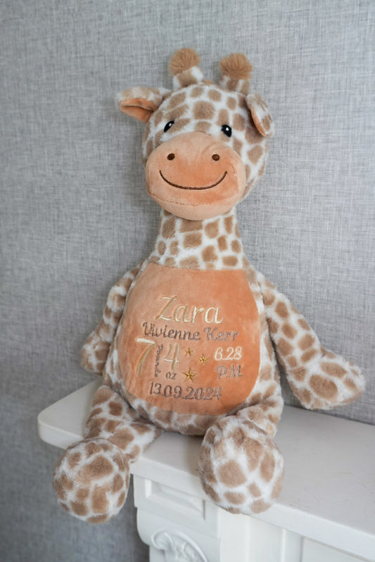 A cute giraffe teddy bear, approximately 42cm long. Personalised with baby's name, weight, time and date of birth. Ideal new baby gift.